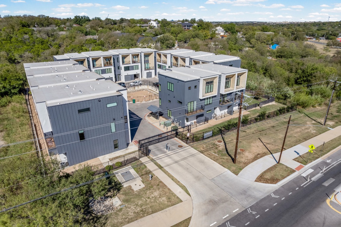 6020 Springdale Road, Unit 12 Austin, TX 78723 - Photo 26 of 28 an aerial view of a house with a yard