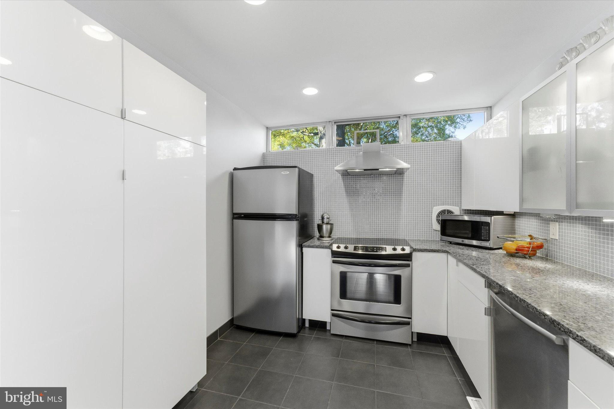 1378 4th Street Southwest Washington, DC 20024 - Photo 13 of 74 a kitchen with a refrigerator and a stove top oven