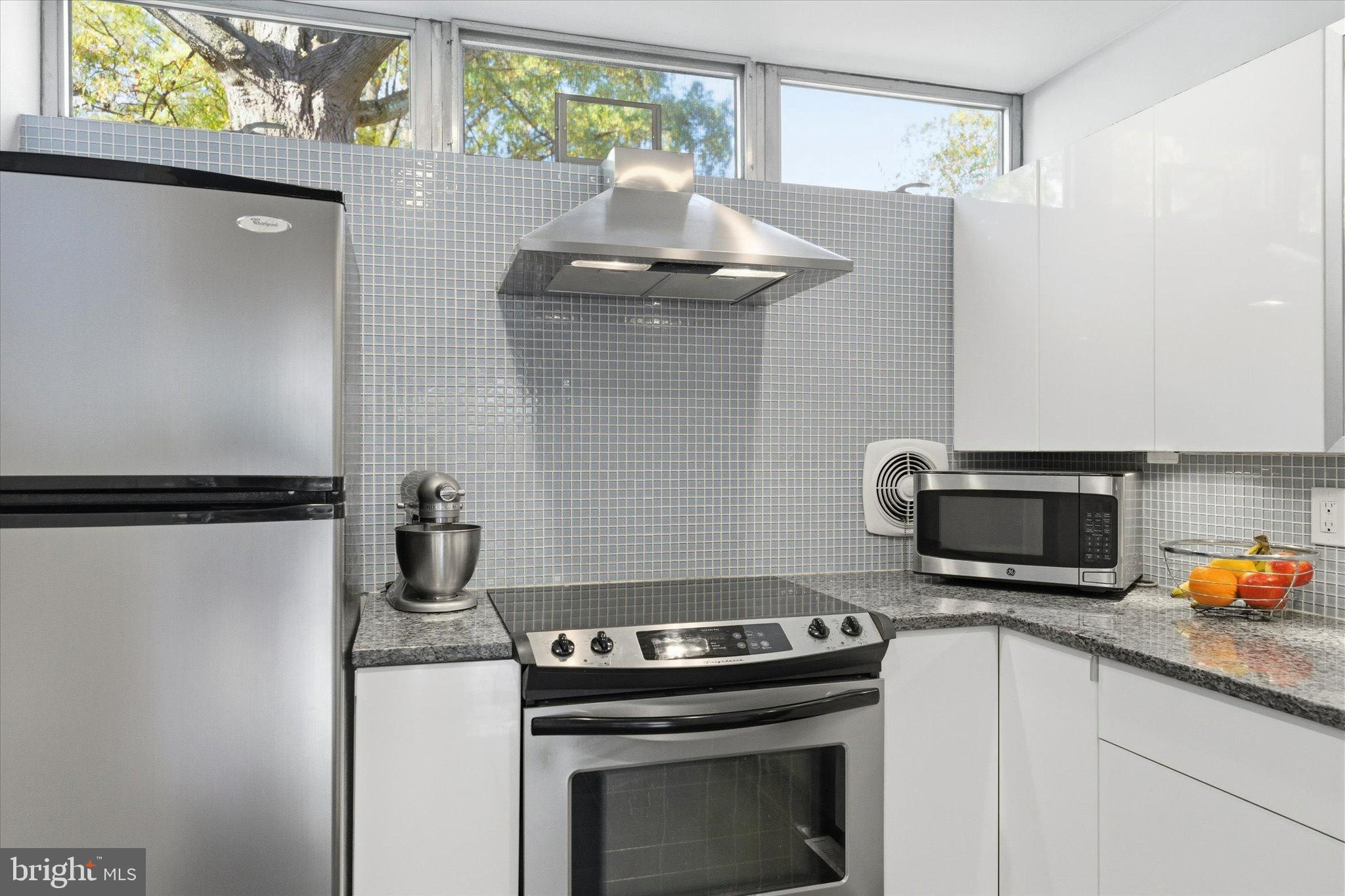 1378 4th Street Southwest Washington, DC 20024 - Photo 16 of 74 a kitchen with stainless steel appliances a stove a microwave and a refrigerator