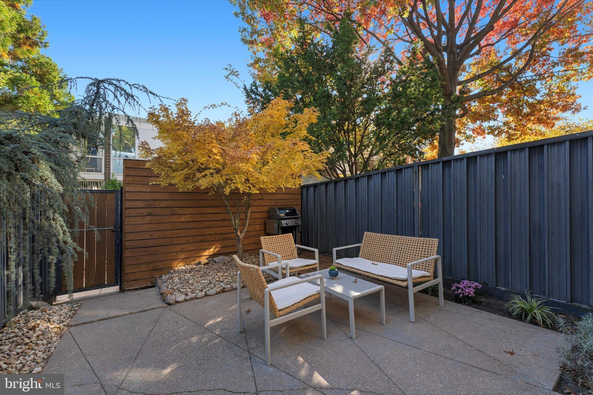1378 4th Street Southwest Washington, DC 20024 - Photo 18 of 74 a backyard of a house with a yard and outdoor seating