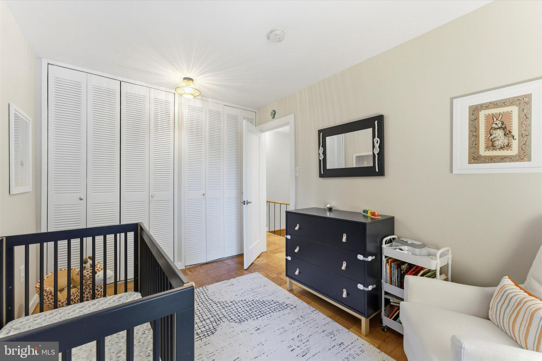 1378 4th Street Southwest Washington, DC 20024 - Photo 31 of 74 a bedroom with a bed and furniture