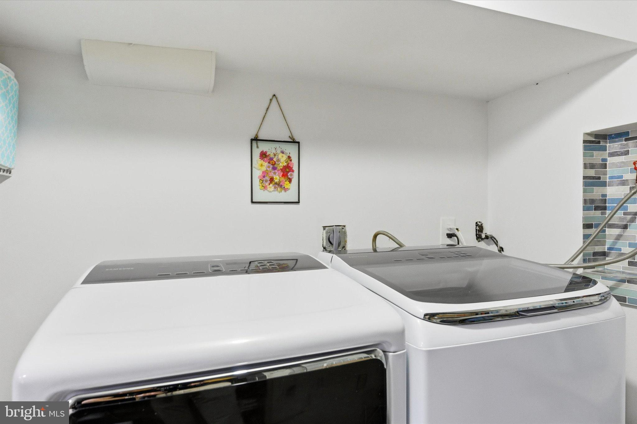 1378 4th Street Southwest Washington, DC 20024 - Photo 37 of 74 Modern laundry space with vibrant decor.