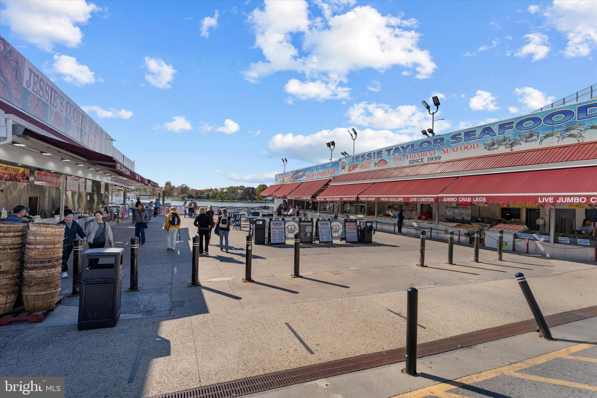 1378 4th Street Southwest Washington, DC 20024 - Photo 66 of 74 a view of a patio with dining table and chairs with a barbeque