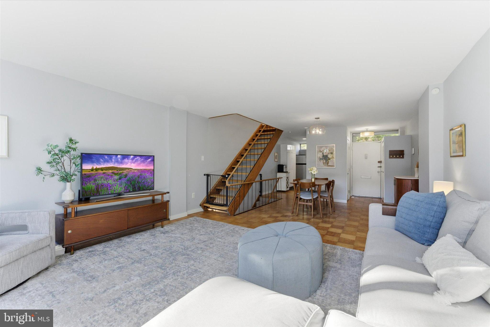 1378 4th Street Southwest Washington, DC 20024 - Photo 8 of 74 a living room with furniture and a flat screen tv