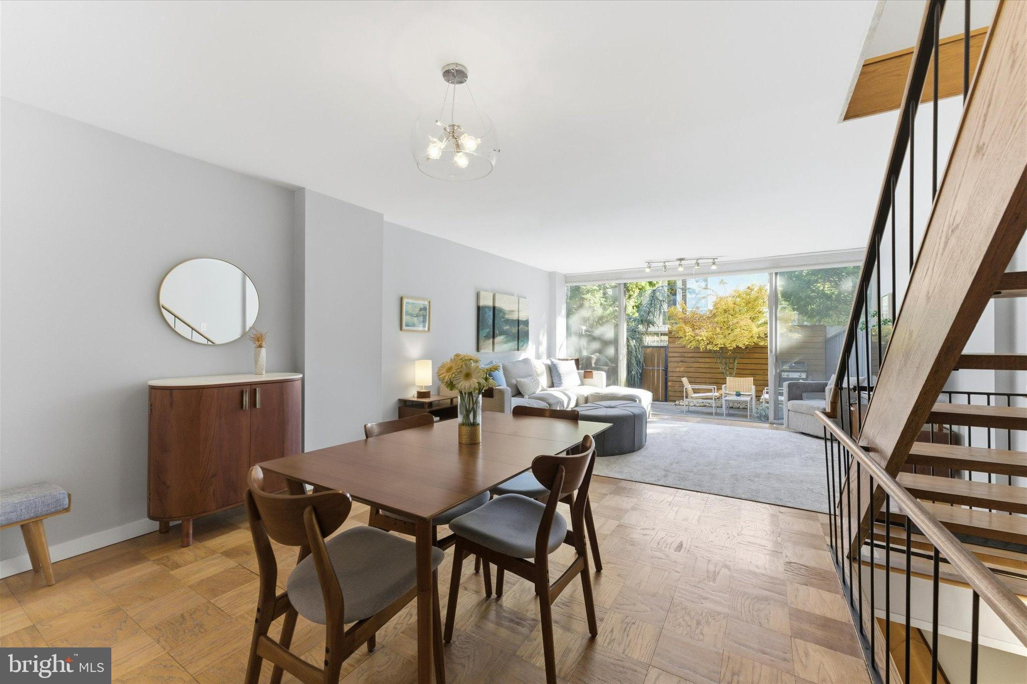 1378 4th Street Southwest Washington, DC 20024 - Photo 9 of 74 a dining room with furniture and a floor to ceiling window