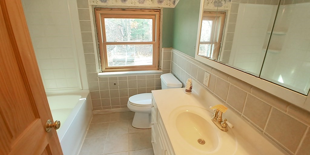 487 Chapin Road Hampden, MA 01036 - Photo 11 of 14 a bathroom with a sink and a toilet