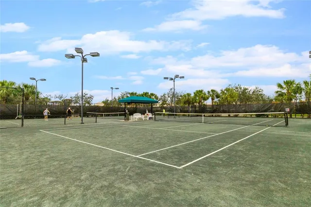 a front view of a house with a lake view