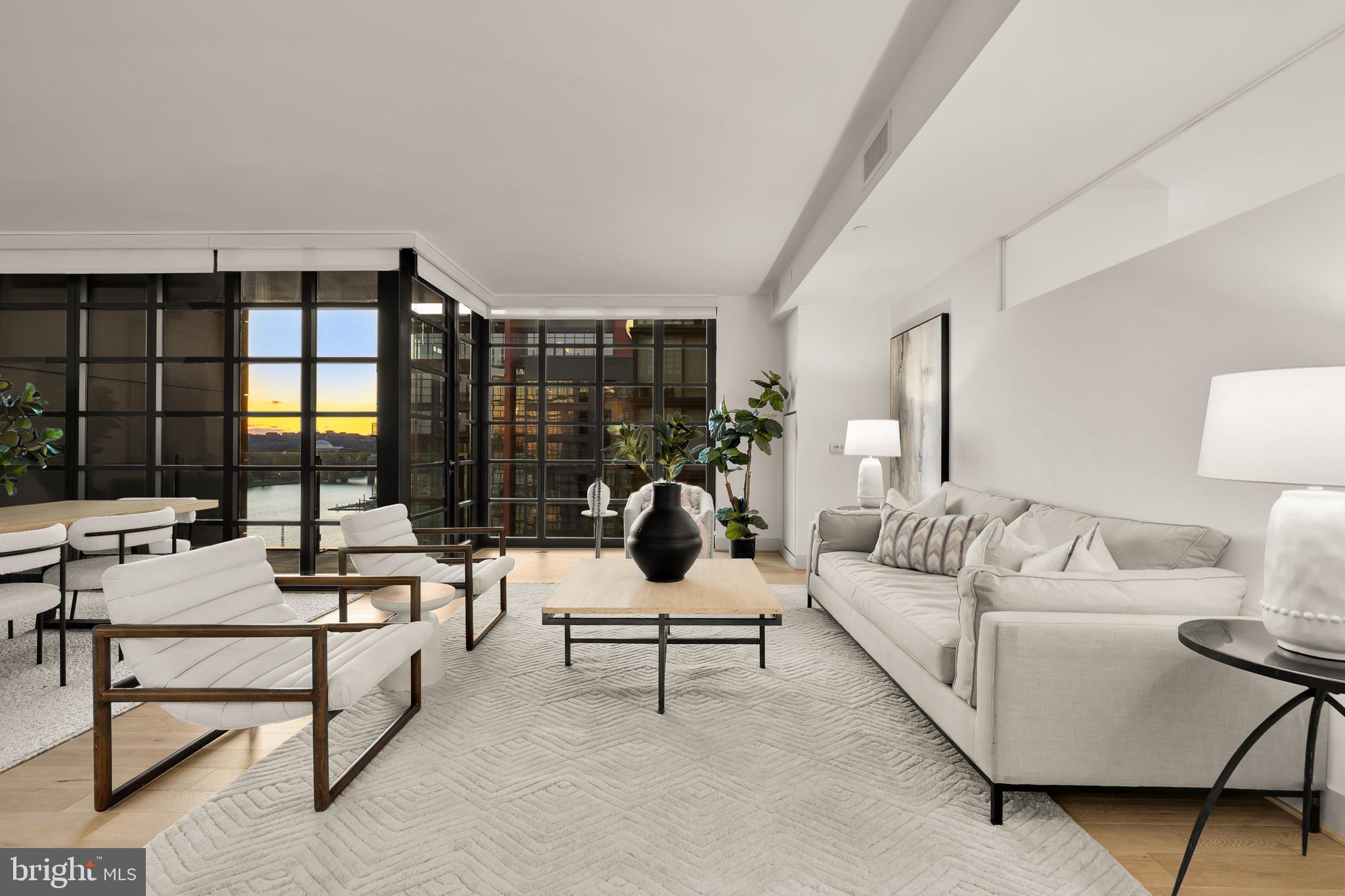 45 Sutton Square Southwest, Unit 906 Washington, DC 20024 - Photo 5 of 50 a living room with furniture