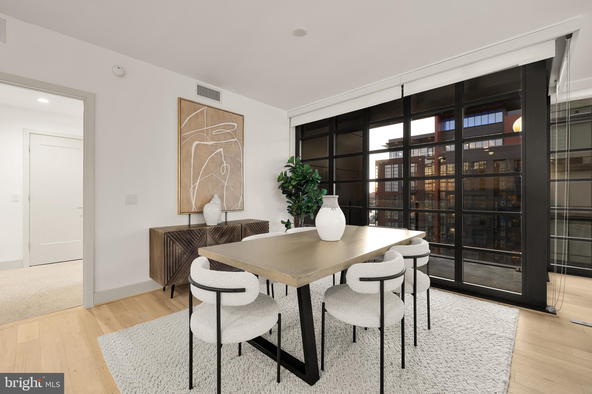 45 Sutton Square Southwest, Unit 906 Washington, DC 20024 - Photo 6 of 50 a view of a dining room with furniture and window