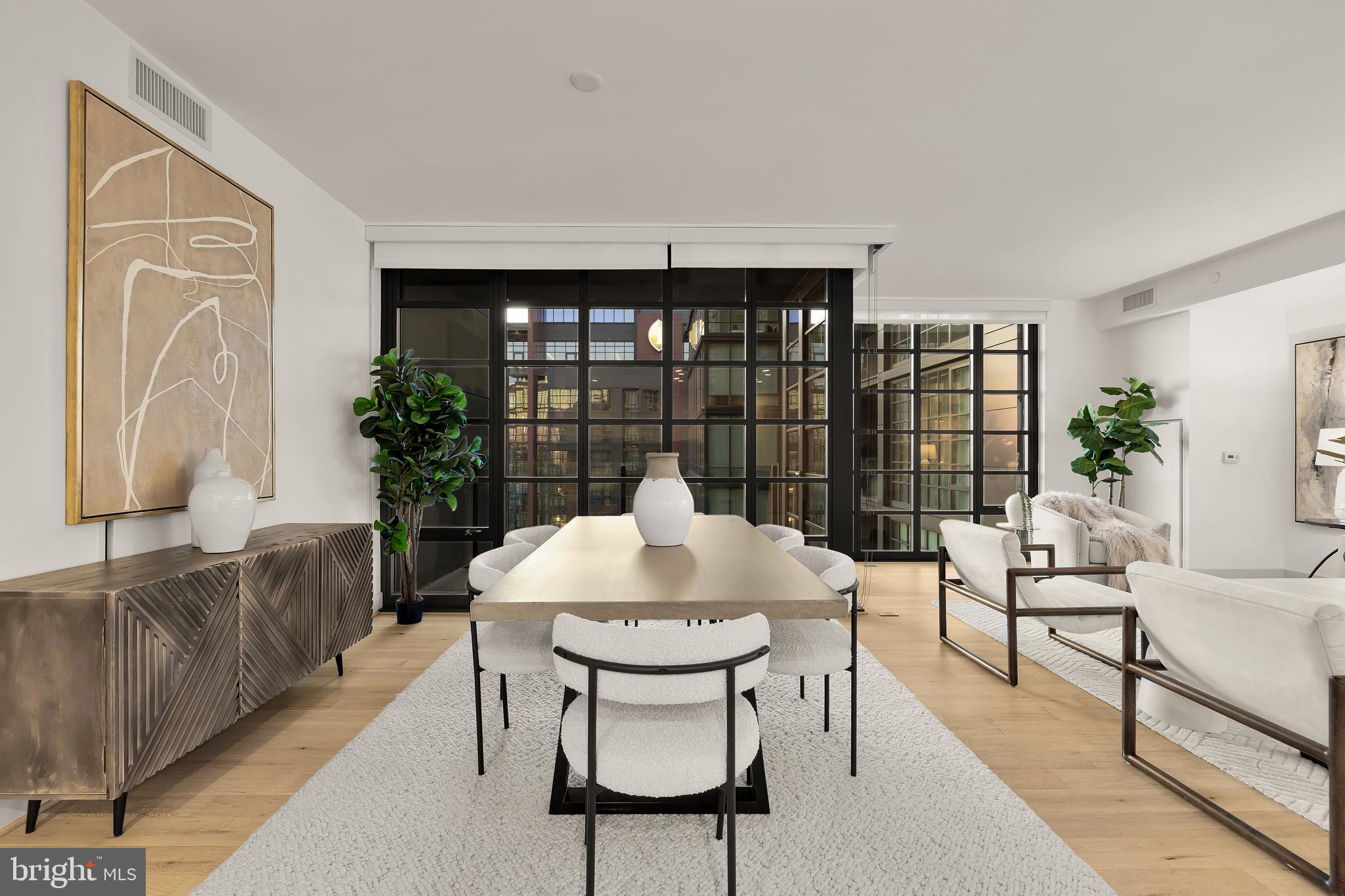45 Sutton Square Southwest, Unit 906 Washington, DC 20024 - Photo 7 of 50 a view of a livingroom with furniture and window