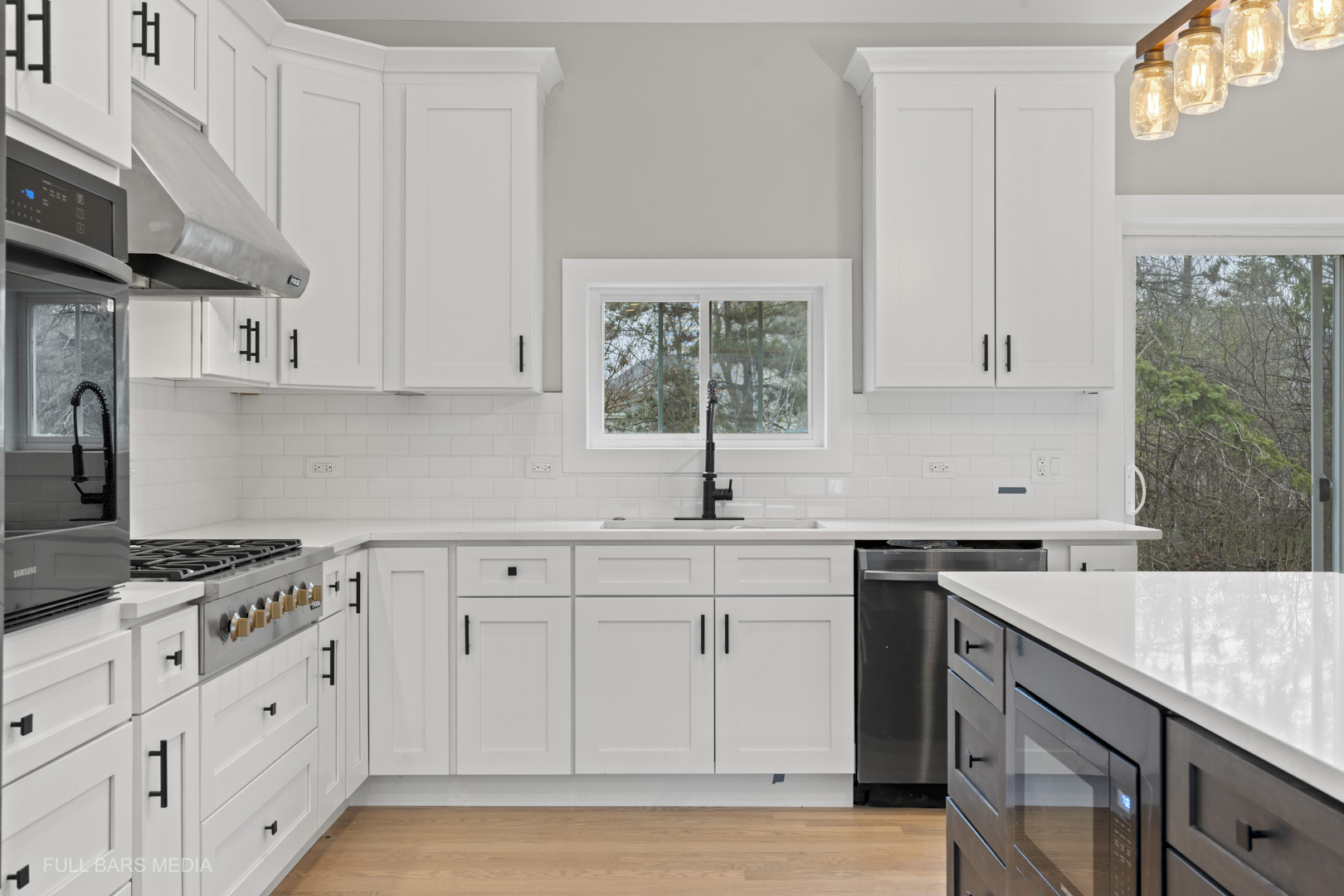 4032 Faith Lane St. Charles, IL 60174 - Photo 11 of 38 a kitchen with granite countertop a sink stove and cabinets