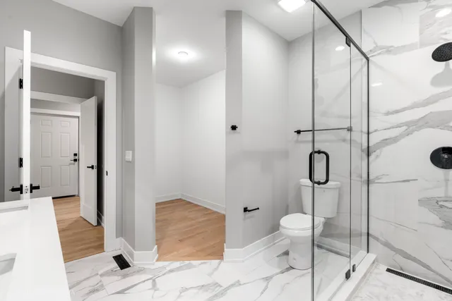 a bathroom with a double vanity sink and mirror