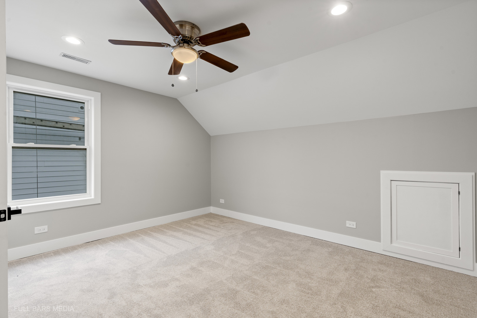 4032 Faith Lane St. Charles, IL 60174 - Photo 30 of 38 an empty room with a window and a ceiling fan