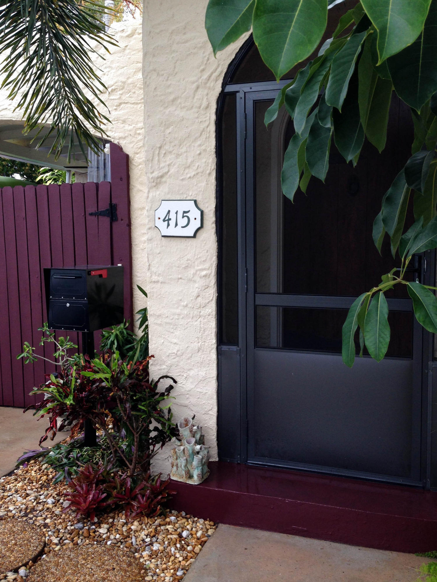 415 Plymouth Road West Palm Beach, FL 33405 - Photo 2 of 47 Screened Porch and Mailbox