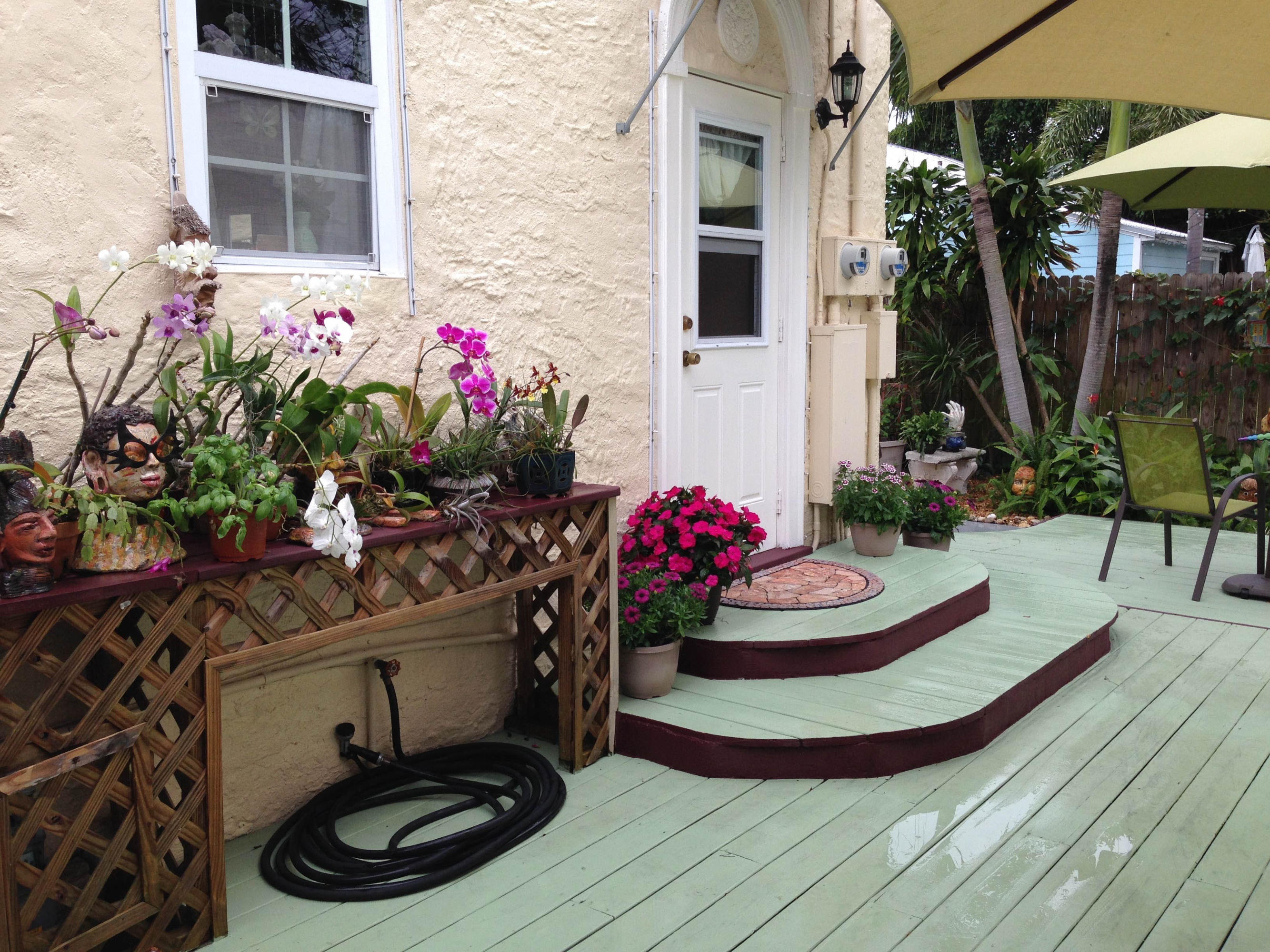 415 Plymouth Road West Palm Beach, FL 33405 - Photo 25 of 47 Back Door and Orchid Shelf