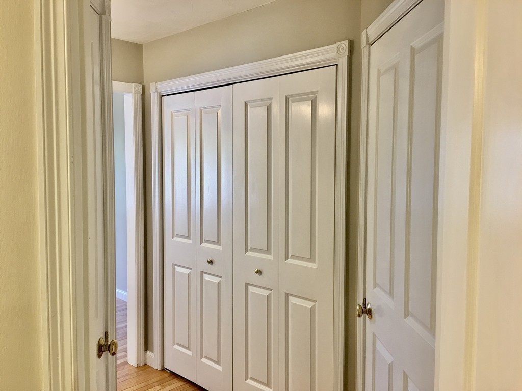 3 Strawberry Lane, Unit A Hudson, MA 01749 - Photo 19 of 29 a view of a wooden door