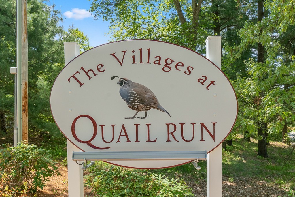 3 Strawberry Lane, Unit A Hudson, MA 01749 - Photo 29 of 29 a view of a sign of a park next to a road