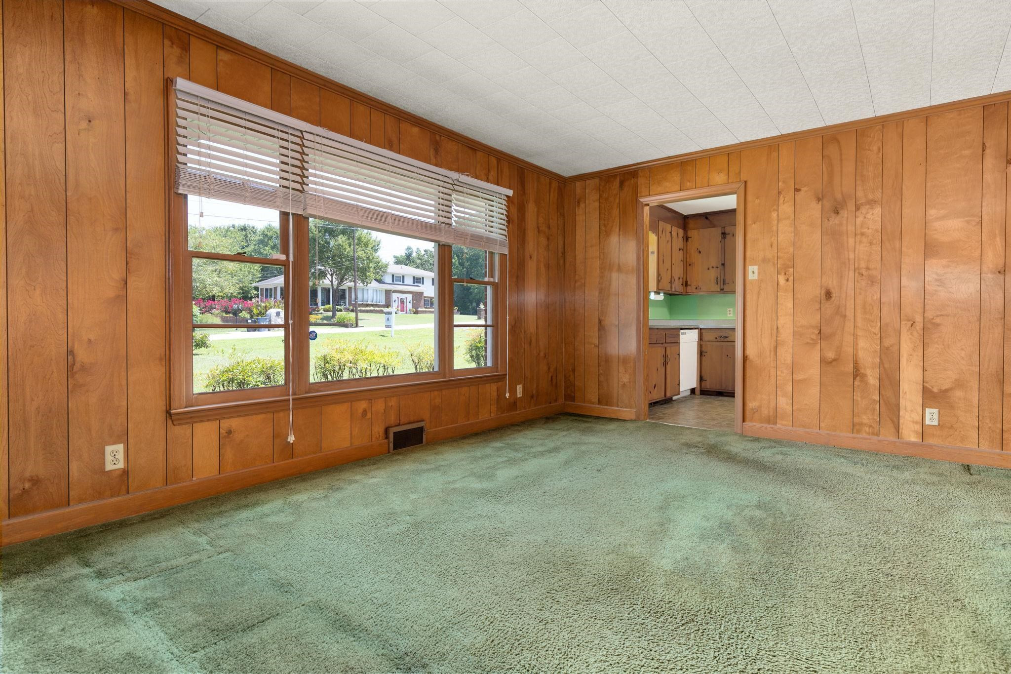 1309 Alpha Road Henderson, NC 27536 - Photo 16 of 26 an empty room with windows