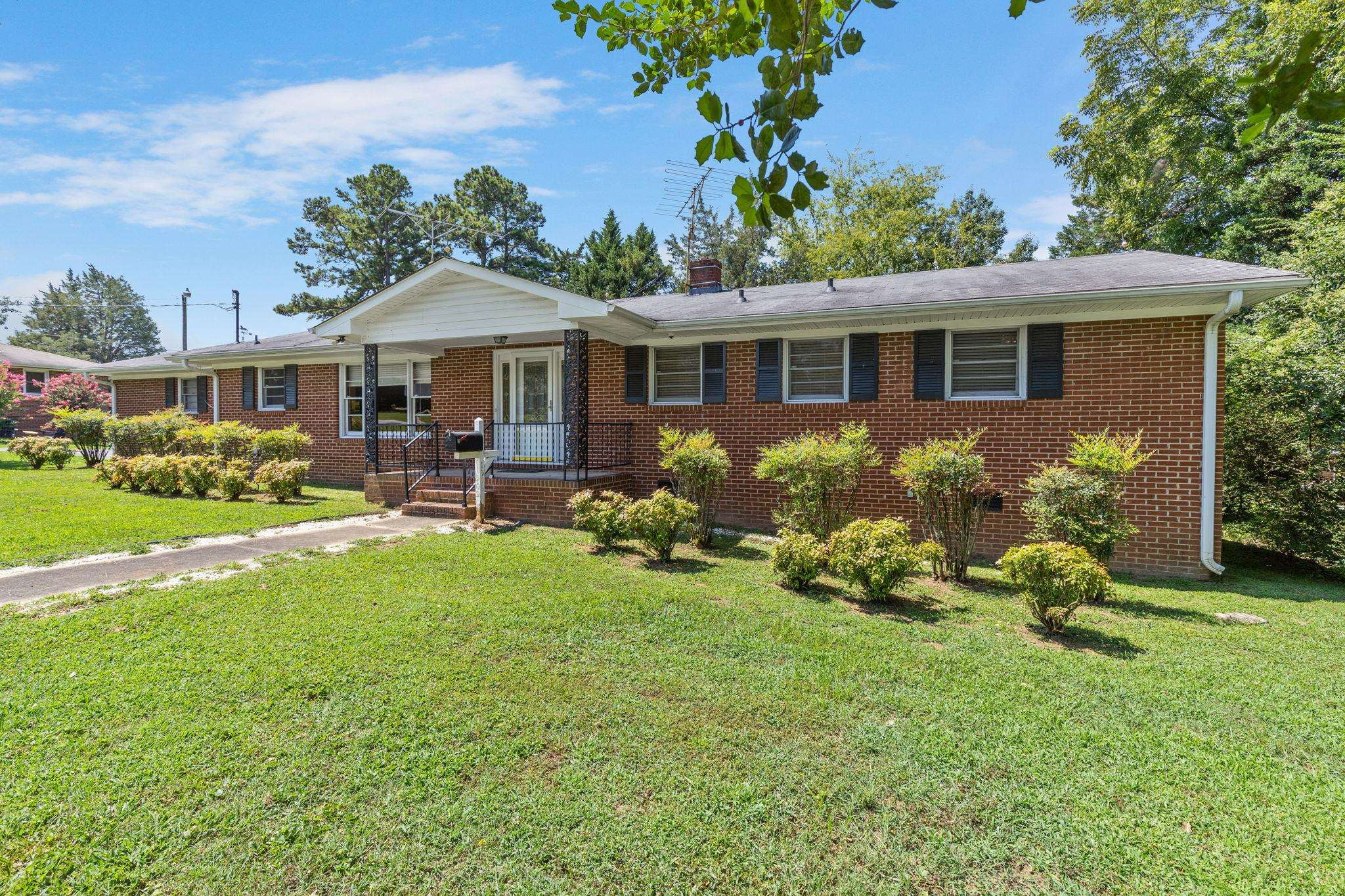 1309 Alpha Road Henderson, NC 27536 - Photo 26 of 26 a front view of house with yard and green space