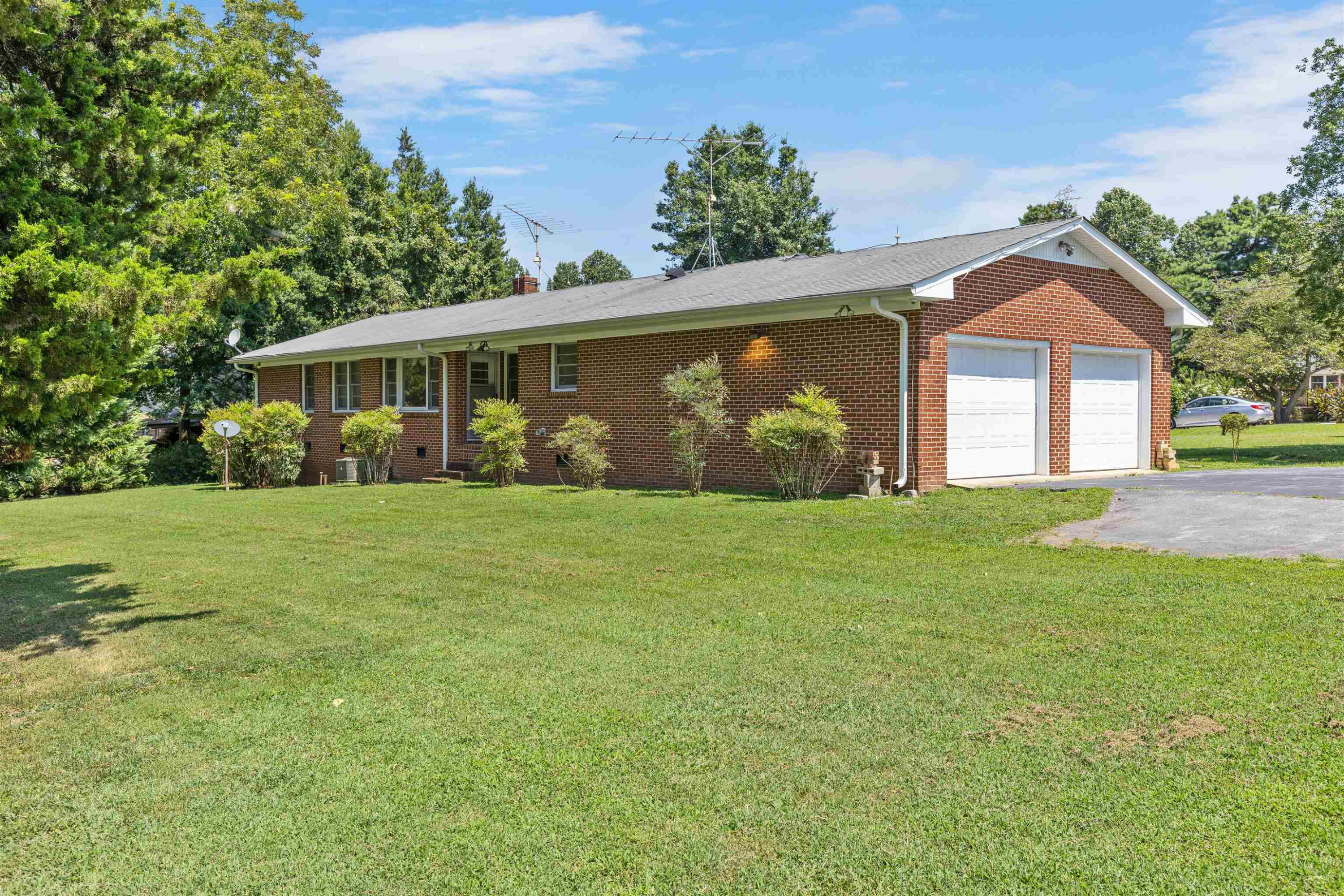 1309 Alpha Road Henderson, NC 27536 - Photo 3 of 26 a front view of house with yard and green space