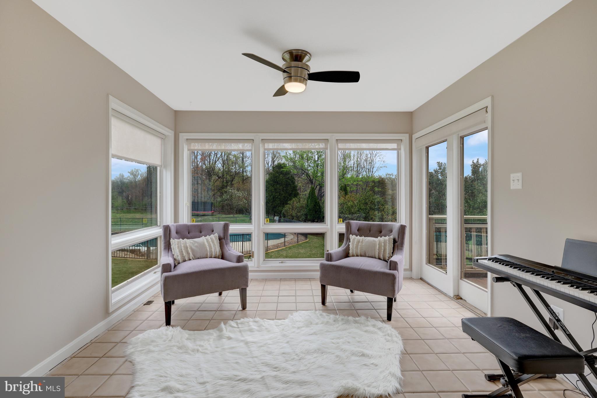 1215 Bishopsgate Way Reston, VA 20194 - Photo 14 of 41 a living room with furniture and a large window