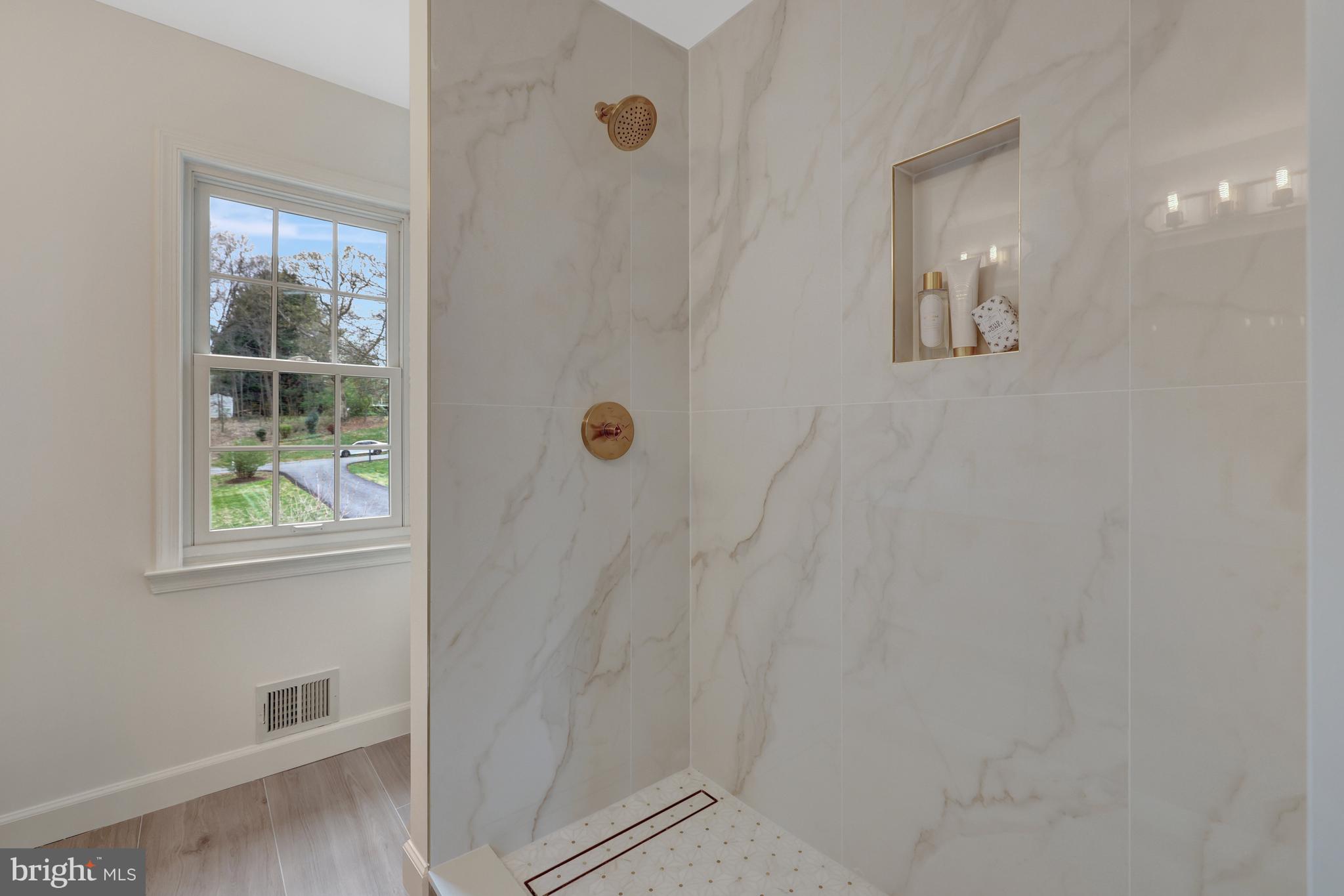 1215 Bishopsgate Way Reston, VA 20194 - Photo 20 of 41 a bathroom with a shower