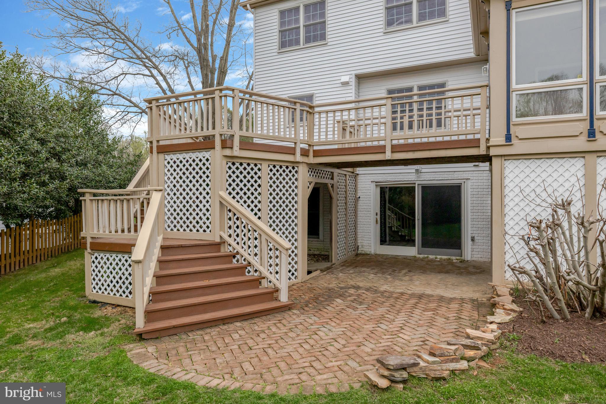 1215 Bishopsgate Way Reston, VA 20194 - Photo 31 of 41 front view of a house with a yard