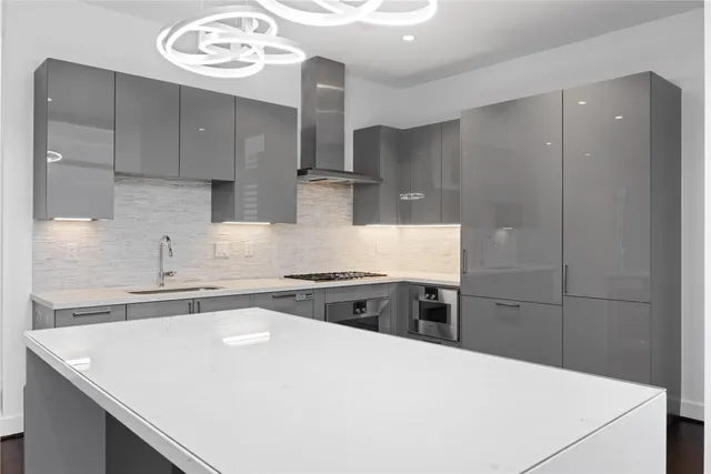 an empty room with closet and a bathroom