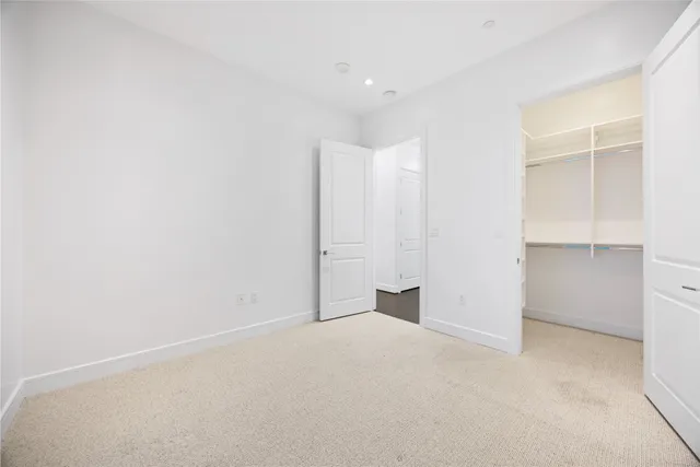 a living room with fireplace furniture and a wooden floor