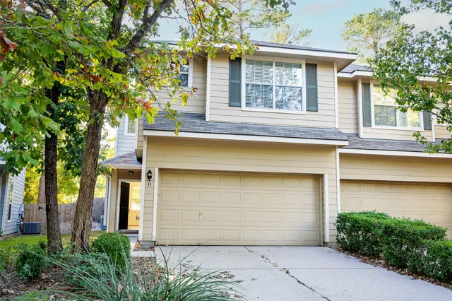 front view of a house with a small yard
