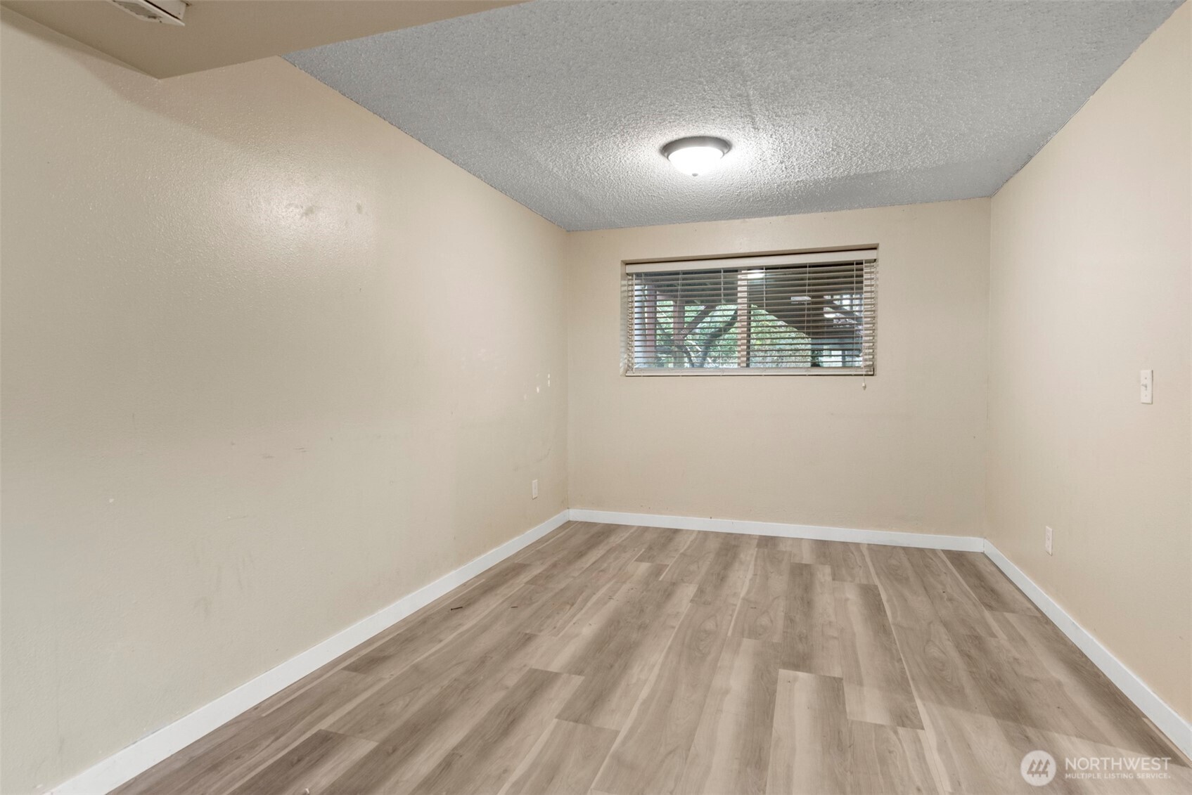 12727 Southeast 191st Place Renton, WA 98058 - Photo 19 of 23 an empty room with a window