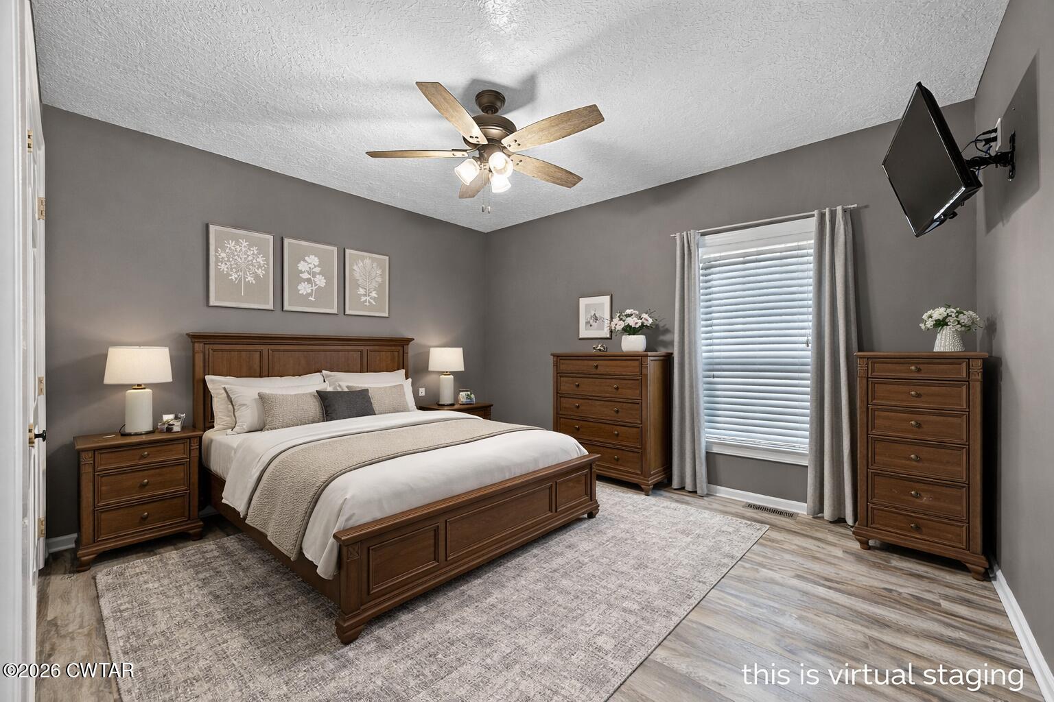 31 Turkey Creek Road Medina, TN 38355 - Photo 18 of 30 a bedroom with a bed and a chandelier