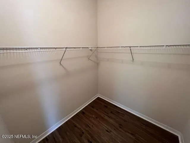 a view of a room with racks on the wall