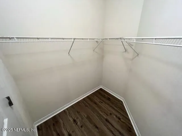 a view of a room with racks on the wall