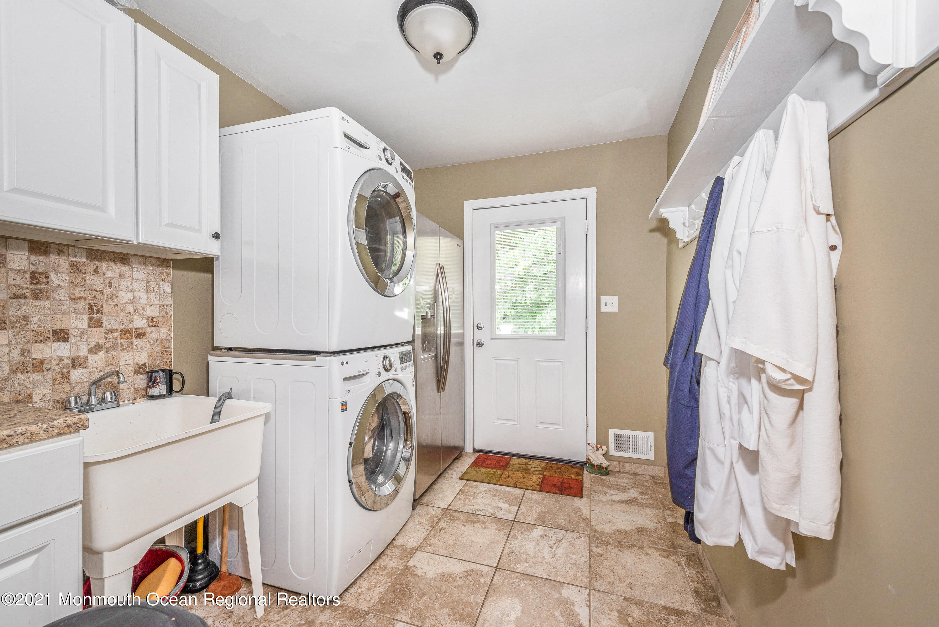 286 Bartley Road Jackson, NJ 08527 - Photo 22 of 45 a view of storage and utility room with washer and dryer