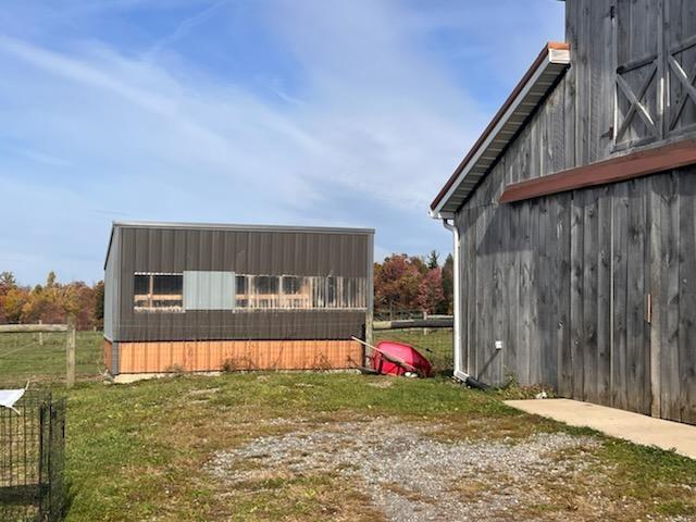 13170 Highway 36 Punxsutawney, PA 15767 - Photo 9 of 37 a view of backyard with swimming pool and seating space