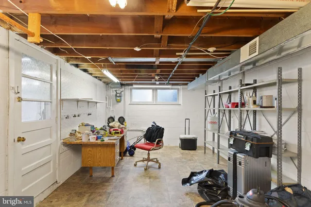 a view of a storage room with racks on the wall