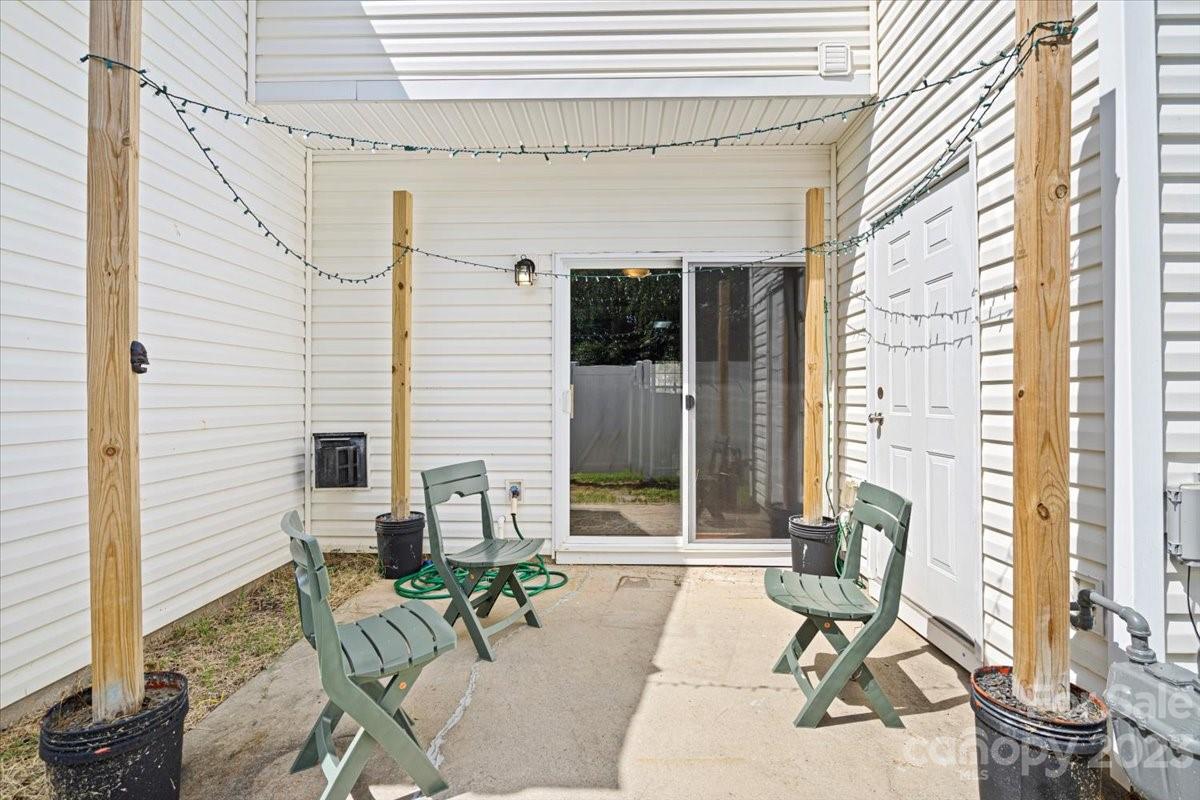 3006 Summerfield Ridge Lane Matthews, NC 28105 - Photo 17 of 17 a balcony with table and chairs