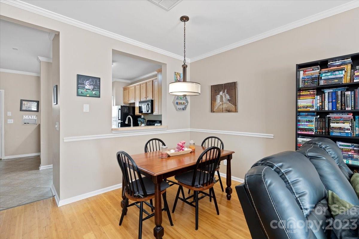 3006 Summerfield Ridge Lane Matthews, NC 28105 - Photo 5 of 17 a view of a dining room with furniture