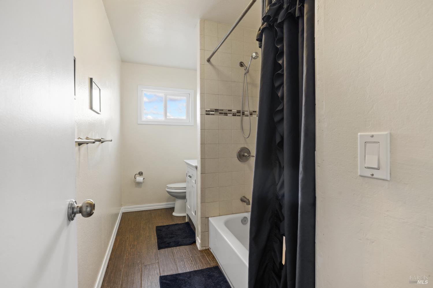 2825 Seneca Lane Santa Rosa, CA 95403 - Photo 22 of 43 This hall bath has been updated with newer tile flooring and fixtures.
