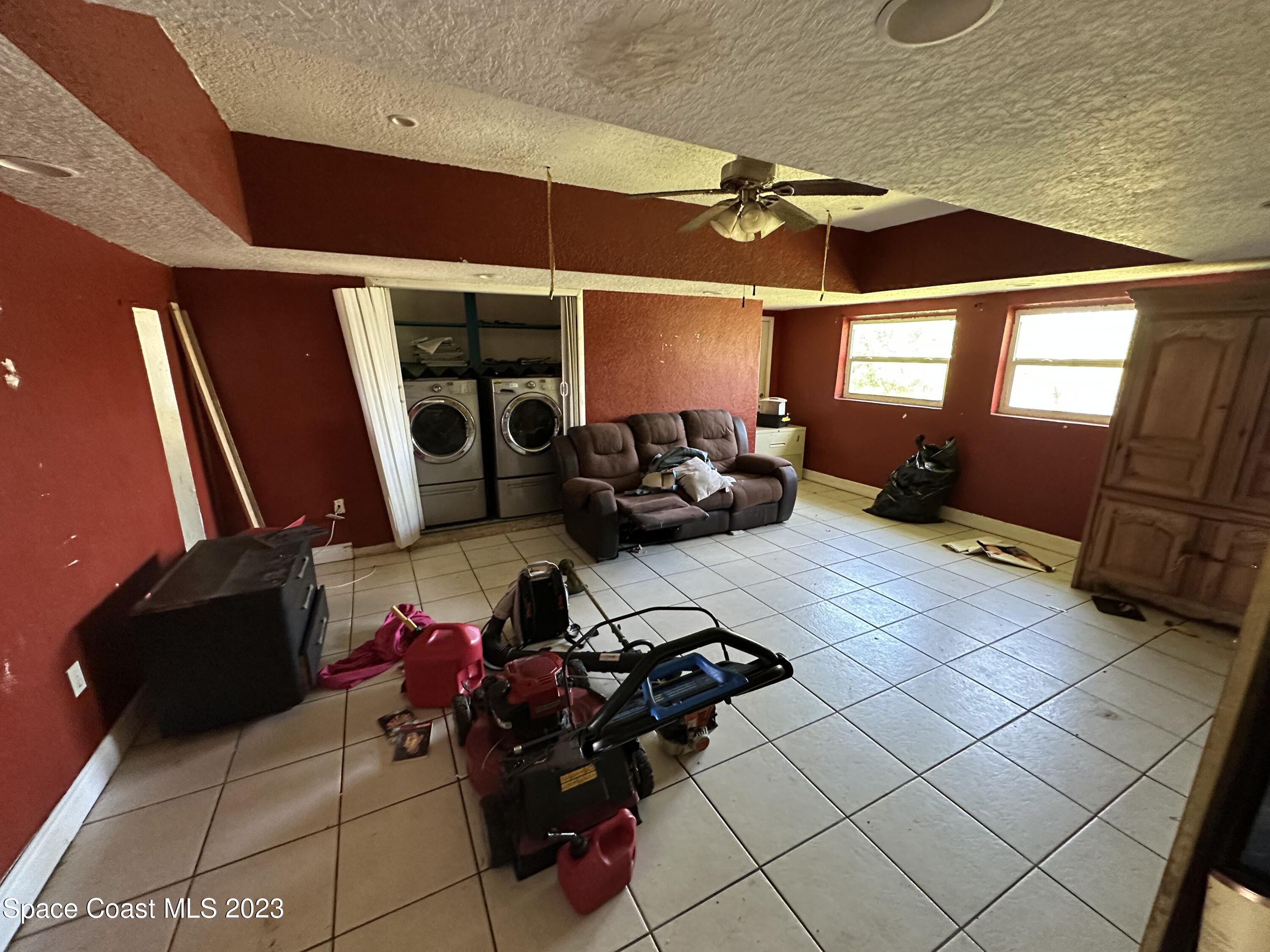 2741 Rhapsody Street Palm Bay, FL 32905 - Photo 3 of 15 IMG_1711