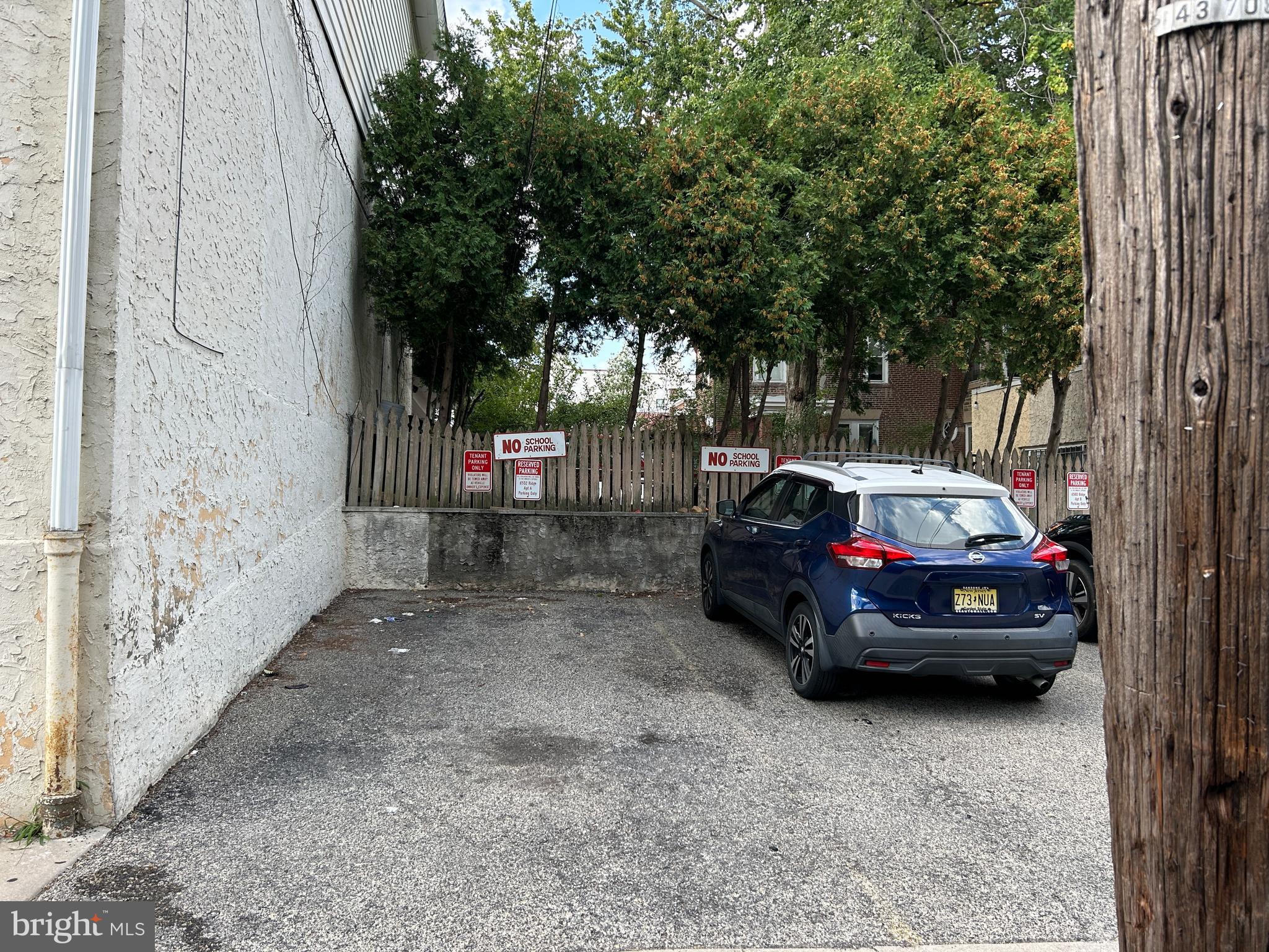 6502 Ridge Avenue, Unit 2 Philadelphia, PA 19128 - Photo 12 of 12 a car parked in front of a house