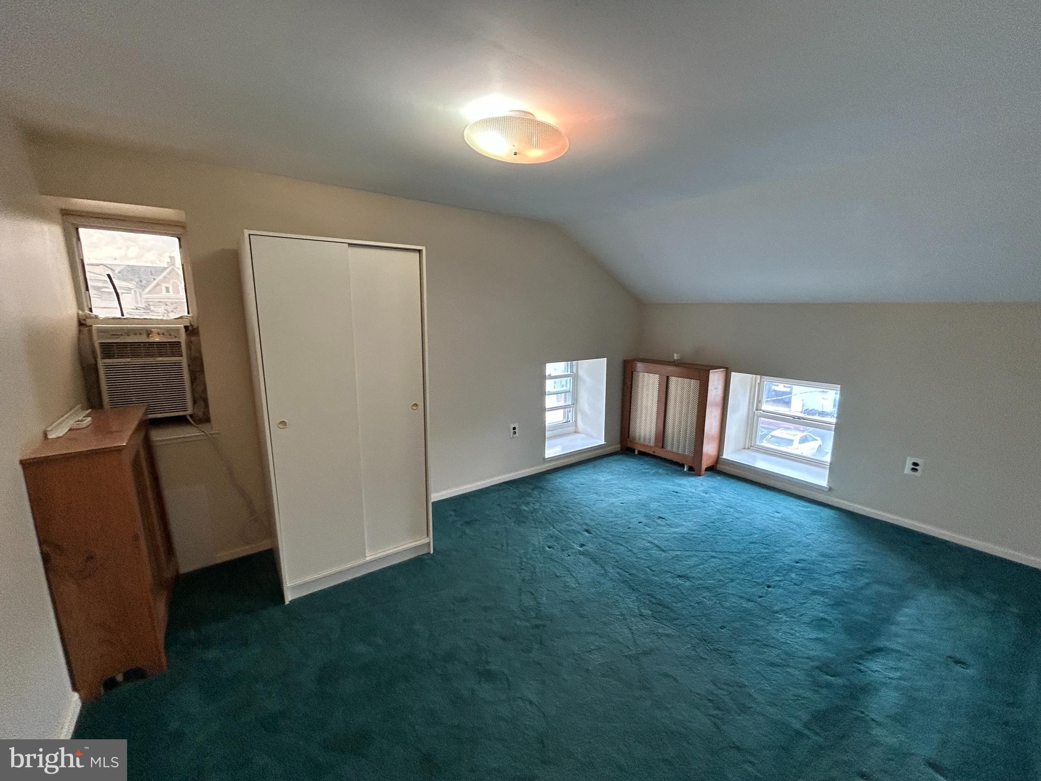 6502 Ridge Avenue, Unit 2 Philadelphia, PA 19128 - Photo 7 of 12 a view of empty room with window and fireplace