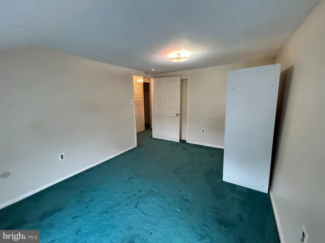 an empty room with an empty space and a window