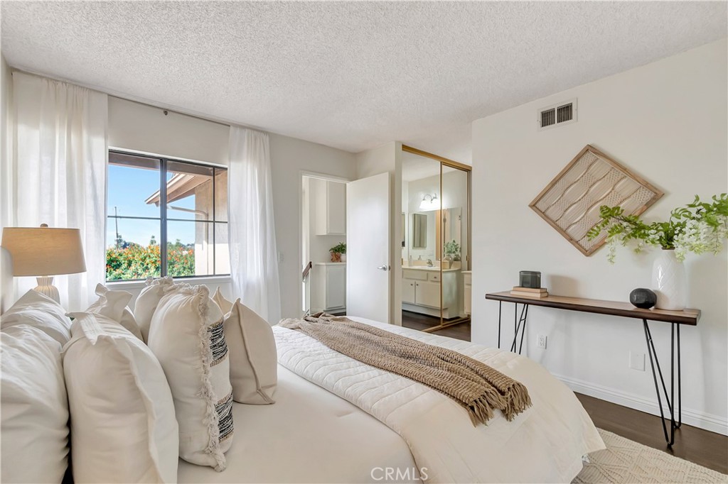 2245 Cheyenne Way, Unit 46 Fullerton, CA 92833 - Photo 20 of 30 a bed room with a bed and a window