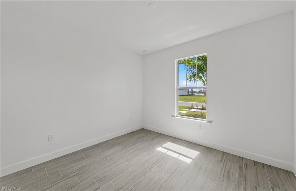 15707 Northridge Road Punta Gorda, FL 33982 - Photo 13 of 21 an empty room with a window
