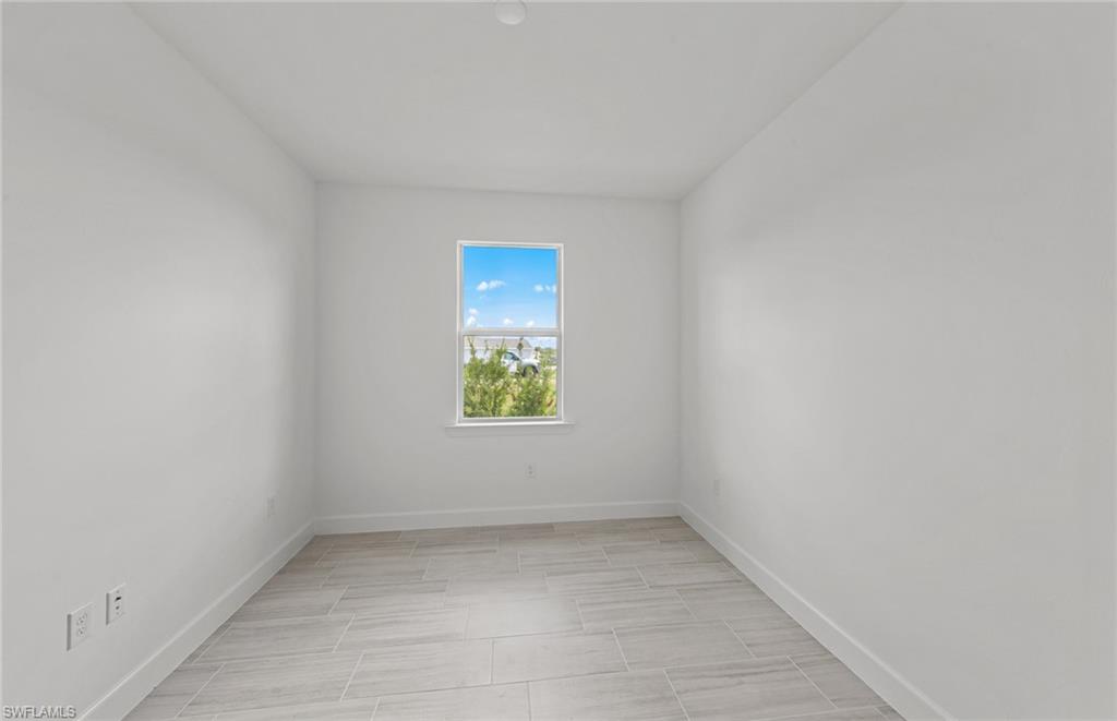 15707 Northridge Road Punta Gorda, FL 33982 - Photo 14 of 21 an empty room with windows