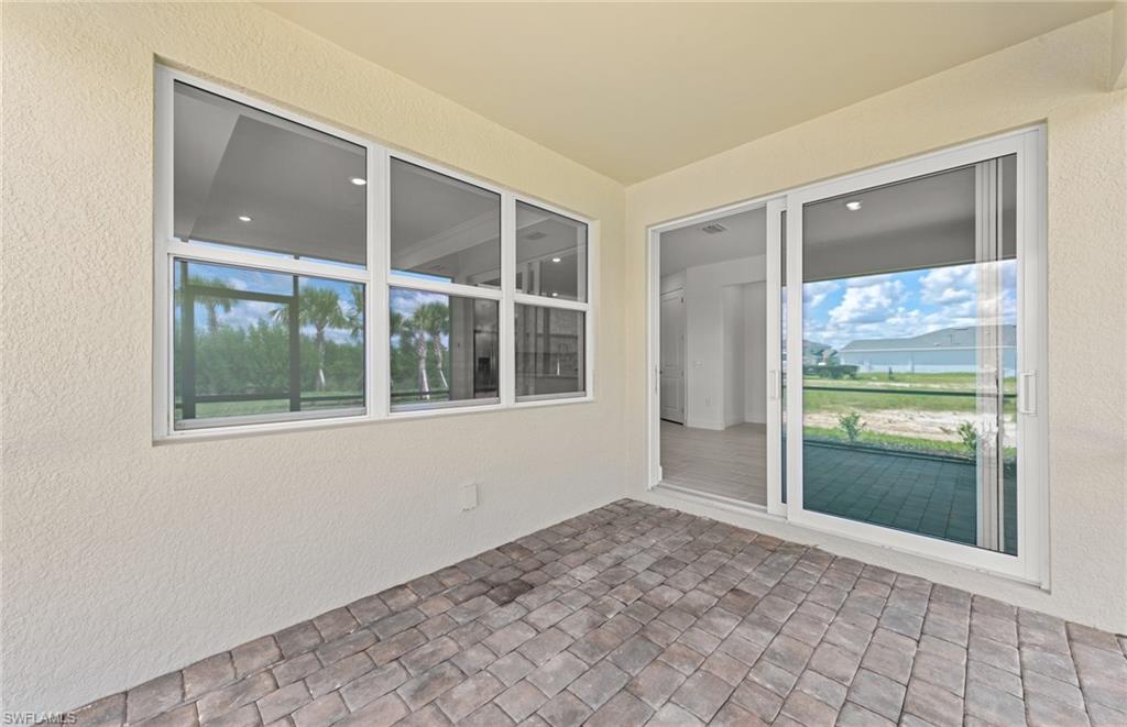 15707 Northridge Road Punta Gorda, FL 33982 - Photo 17 of 21 a view of an empty room with a window