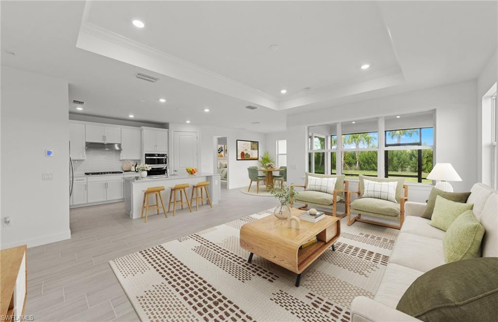 15707 Northridge Road Punta Gorda, FL 33982 - Photo 2 of 21 a living room with furniture and a large window