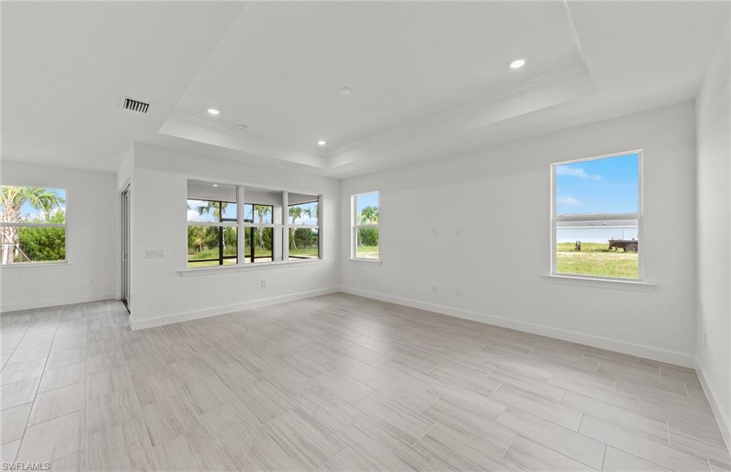 15707 Northridge Road Punta Gorda, FL 33982 - Photo 8 of 21 an empty room with windows